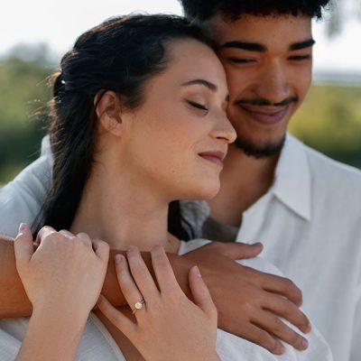 Groom holding his bride